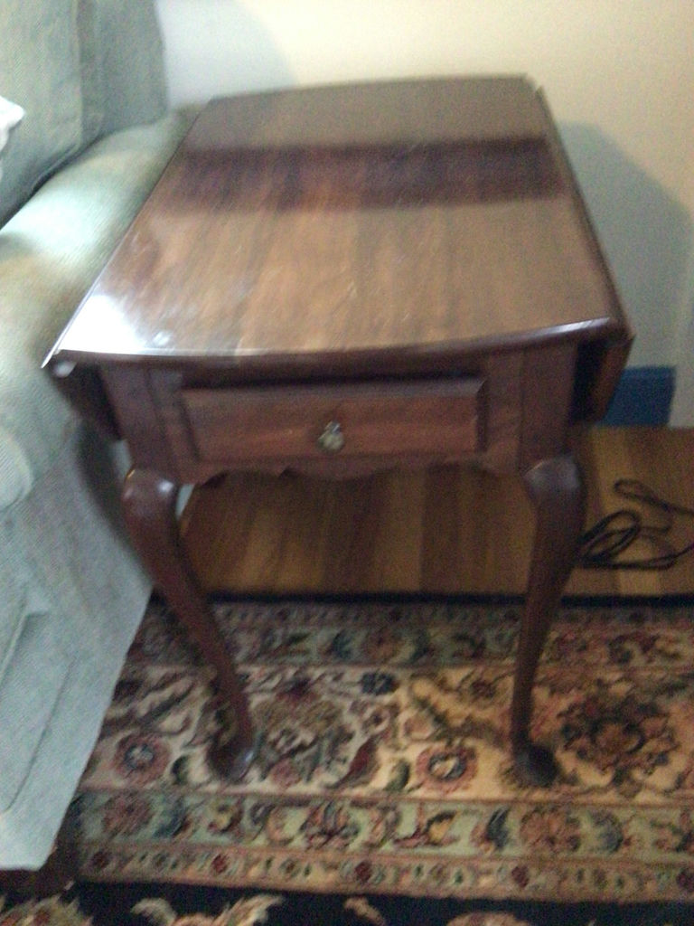 Dark wood end table with single drawer and curved legs - image 1 of 3