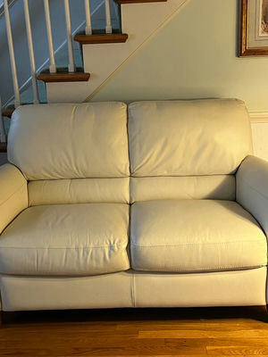  Cream leather love seat 63” - Image 1 of 1