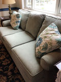 upholstered sofa with floral throw pillows - thumbnail 3 of 4
