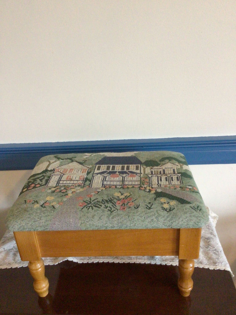 Storage ottoman with tapestry upholstery and wooden legs - image 1 of 3