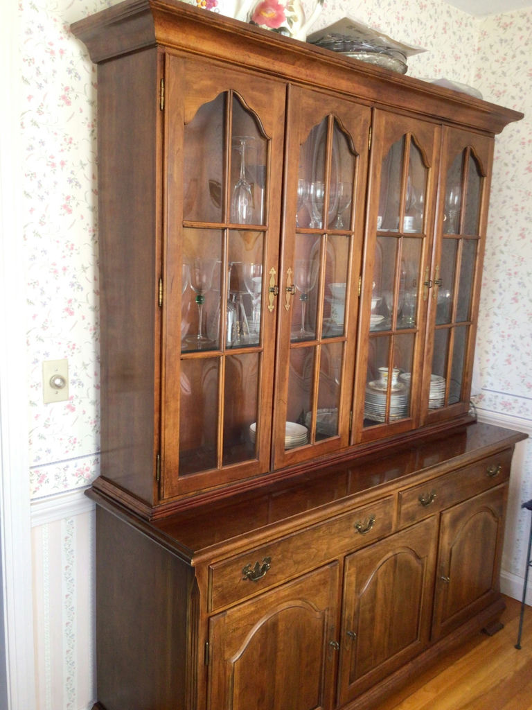 Wooden china cabinet with glass-front display and lower storage - image 1 of 2