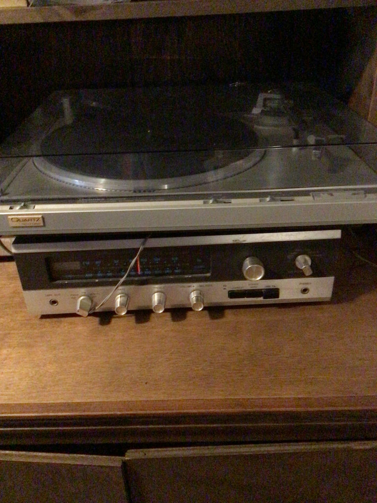 Vintage quartz direct-drive turntable with built-in stereo receiver - image 1 of 4