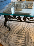 Glass-top coffee table with ornate wrought-iron grapevine frame 50x24 - thumbnail 2 of 2