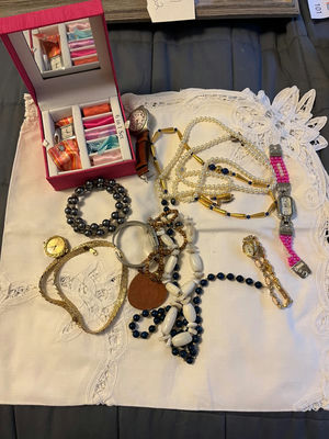 Jewelry assortment with necklaces, bracelets, and watch - Image 1 of 1