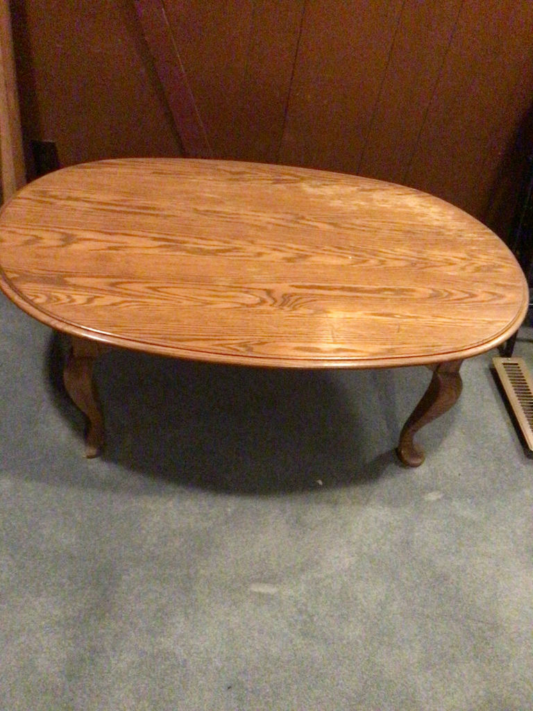 Oval wooden coffee table with curved legs - image 1 of 2