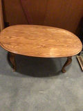 Oval wooden coffee table with curved legs - thumbnail 1 of 2