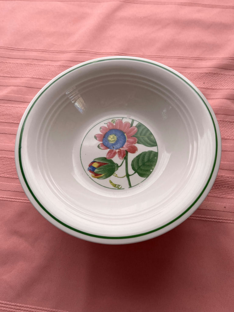 Floral ceramic serving bowl with green rim  - image 1 of 2