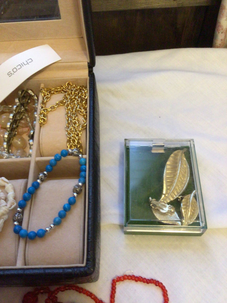 Jewelry box with assorted necklaces and bracelets - image 4 of 5