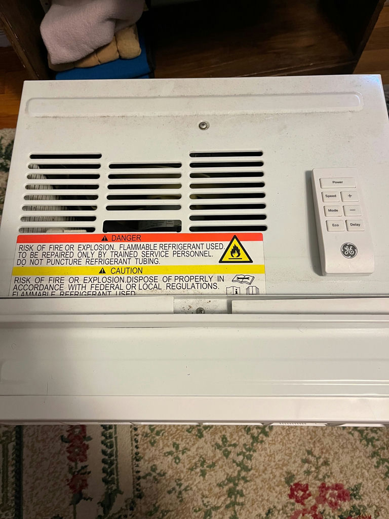 White GE window air conditioner with remote - image 2 of 3