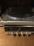 Vintage quartz direct-drive turntable with built-in stereo receiver - thumbnail 2 of 4