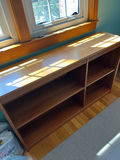 Wooden long console with top surface and open cubby storage - thumbnail 1 of 1