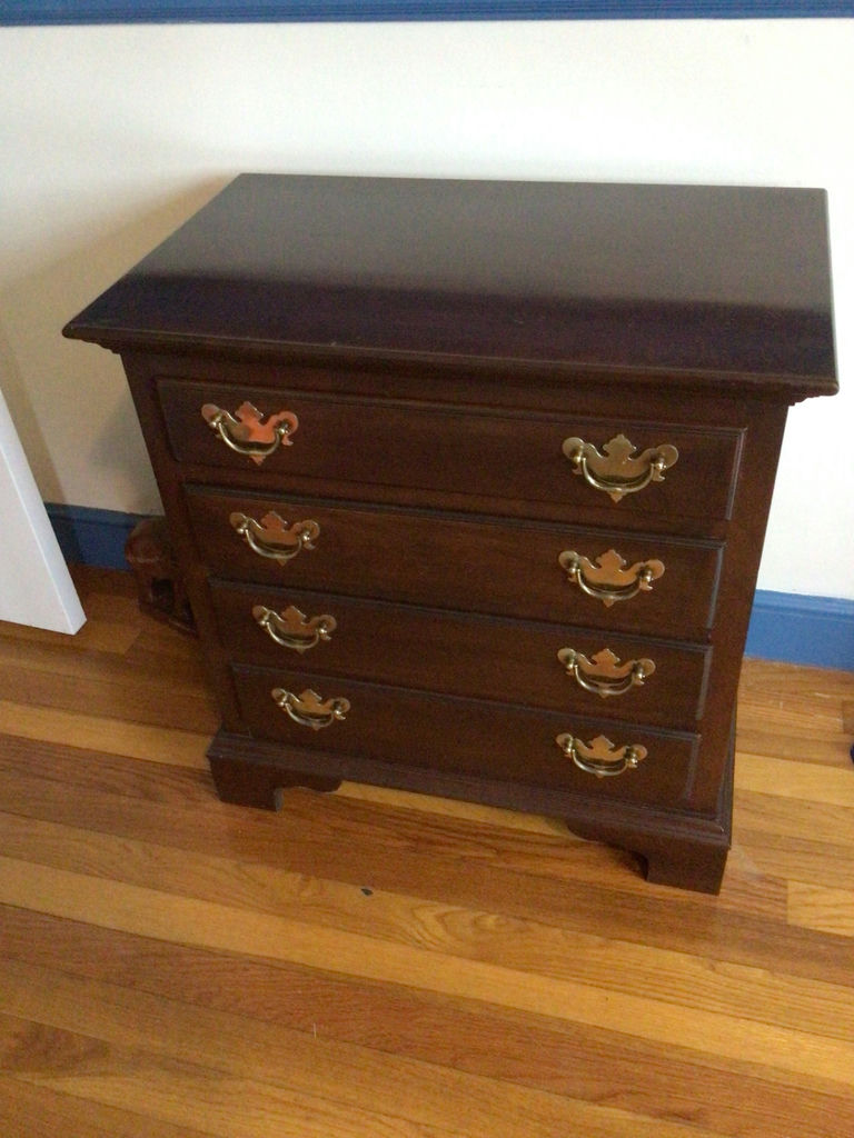 Dark wooden dresser with brass handles - image 1 of 4
