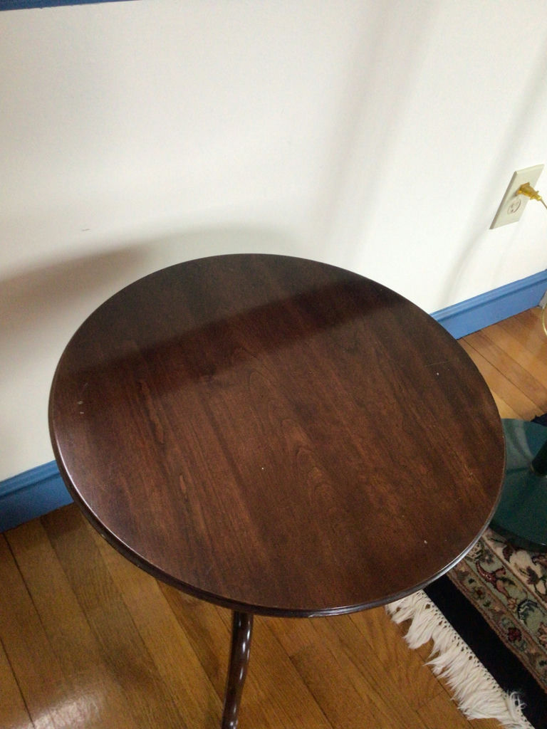 Round dark wood pedestal table - image 2 of 3