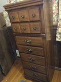 Tall wooden dresser with multiple drawers - thumbnail 2 of 3