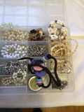 Assorted beads and jewelry in a compartment organizer - thumbnail 5 of 5