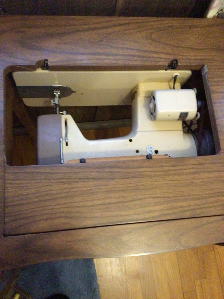 Vintage wooden sewing table with built-in sewing machine - image 3 of 3
