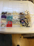 Assorted beads and jewelry in a compartment organizer - thumbnail 2 of 5