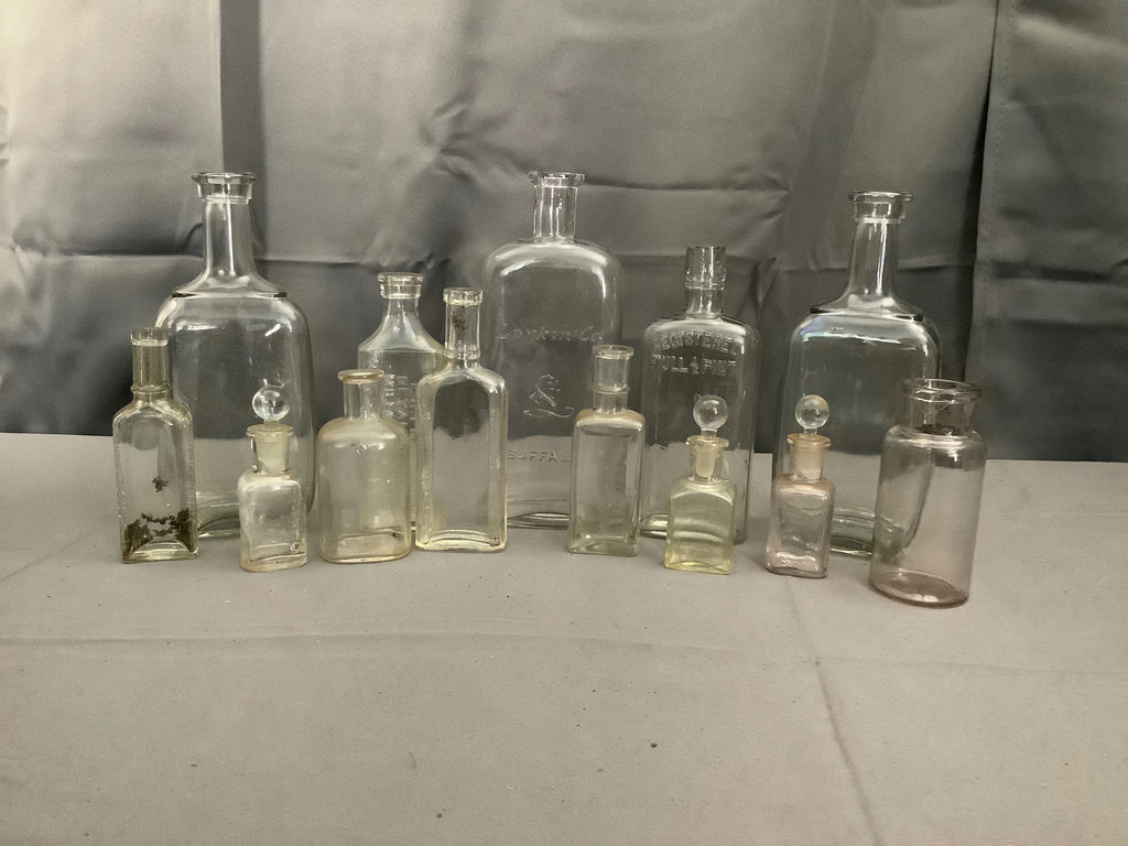 Antique Clear Glass Bottles - image 1 of 13