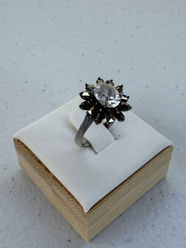 Sterling Silver Ring with Clear Center Stone And Metallic Accents - image 1 of 14