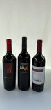 Three Bottles of Red Wine Including Apothic Red, Sandbanks Baco Reserve, and Louis M. Martini Cabernet Sauvignon - thumbnail 1 of 5
