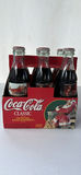 Coca-Cola Collectible Tins and 1997 Holiday Bottle Pack - thumbnail 5 of 13