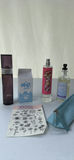 Assorted Fragrance Bottles, Temporary Tattoos, and Cosmetic Pouch - thumbnail 2 of 4