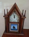 Vintage Wooden Mantel Clock with Ship Illustration - thumbnail 1 of 8