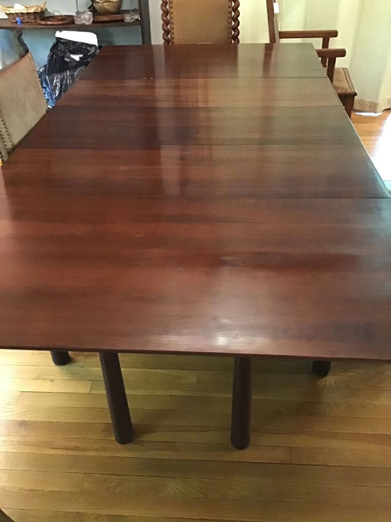 Dark wood dining table with extension leaves 45x44 w/o leaves. 3 leaves total 41 1/2 . Size w leaves 86 1/2 x 44 - image 1 of 4