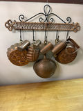 Copper Kitchenware on a Braided Rope Rack - thumbnail 1 of 2