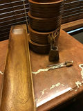 Stacked wooden bowls with a wooden serving tray and a metal utensil holder - thumbnail 2 of 2