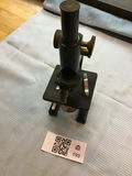 Vintage microscope with brass adjustment knobs - thumbnail 1 of 4