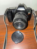 Canon EOS Rebel camera with lens and vintage Kodak camera with accessories - thumbnail 3 of 3