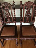4 Ornate carved wooden dining chairs with leather seats $500minimum bid - thumbnail 1 of 3