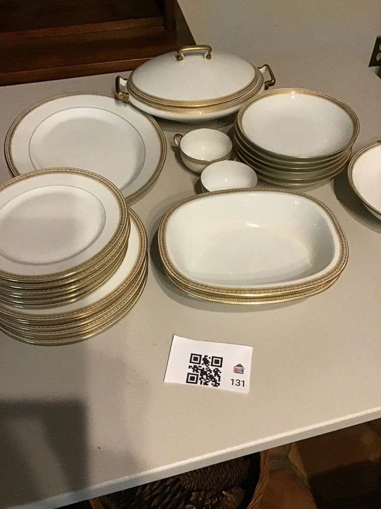 White Limoges porcelain dinnerware set with gold trim and serving pieces - image 1 of 3