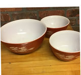 Set of three red PYREX exterior ceramic bowls - thumbnail 1 of 2