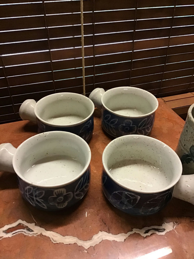 Blue floral ceramic mugs and a speckled gray mug - image 2 of 3