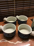 Blue floral ceramic mugs and a speckled gray mug - thumbnail 2 of 3