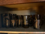 Hammered-metal beer steins with dark tops - thumbnail 1 of 4