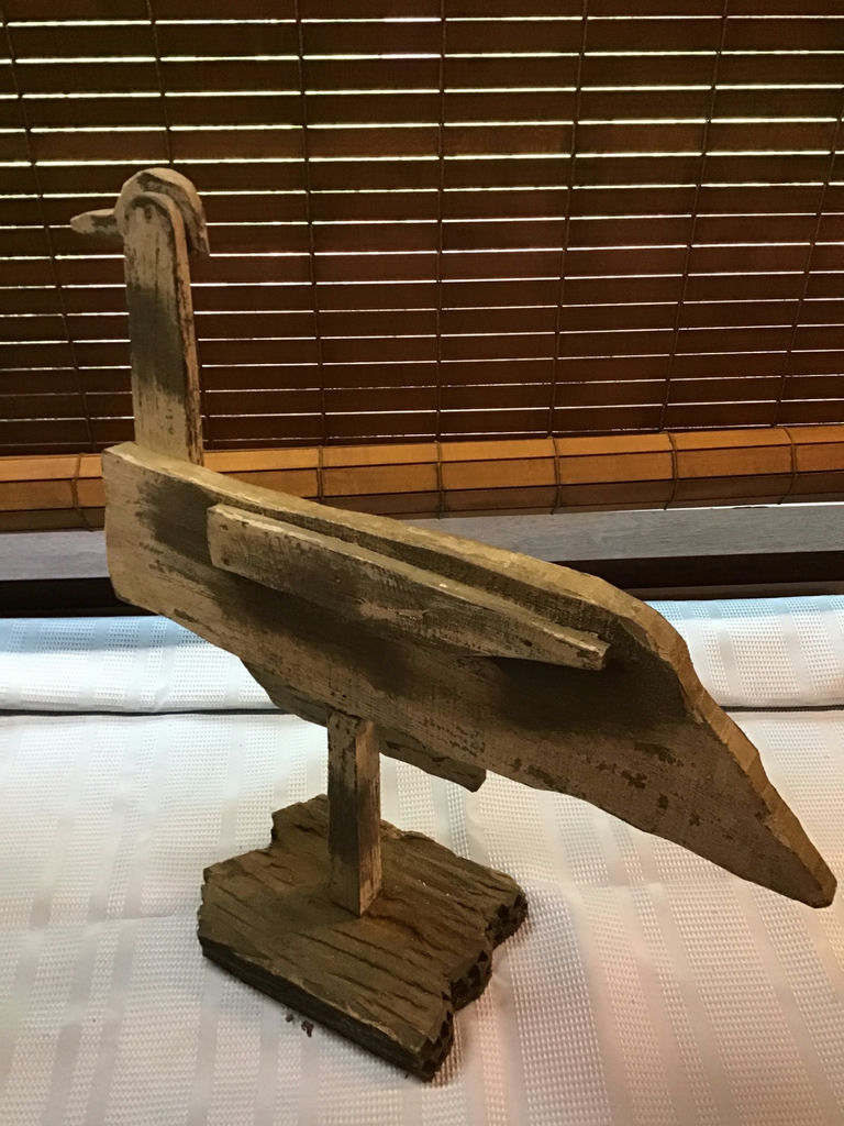 Rustic wooden duck sculpture on a stand - image 3 of 3