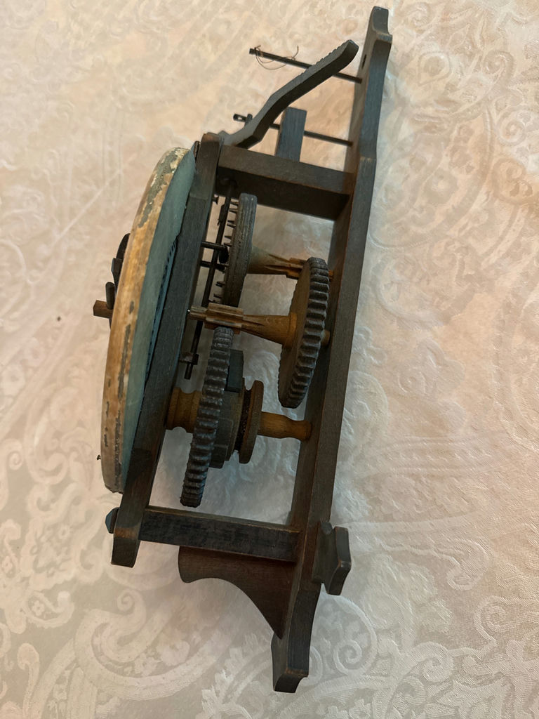 Antique mechanical clock movement with exposed gears - image 2 of 3