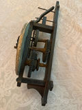 Antique mechanical clock movement with exposed gears - thumbnail 2 of 3