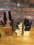 Three wooden knife blocks with assorted kitchen knives - thumbnail 1 of 1