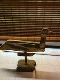 Rustic wooden duck sculpture on a stand - thumbnail 2 of 3
