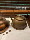 Pair of copper kettles with ceramic-handled lids - thumbnail 3 of 4