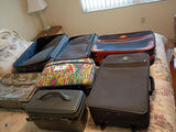 Assorted Suitcases and Travel Bags - thumbnail 1 of 7