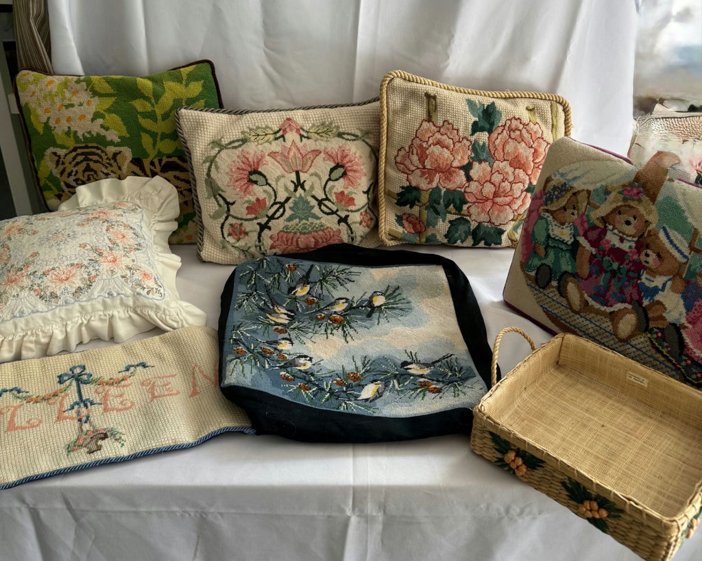 Needlepoint cushions, a woven basket, and a tapestry-top stool - image 1 of 7