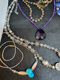 Assorted jewelry collection with pendants and beads - thumbnail 10 of 11