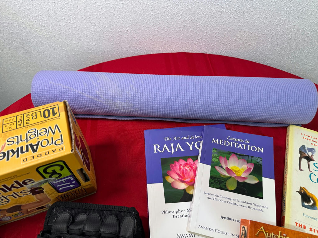 Fitness equipment, yoga mat, massage tools, and meditation books - image 4 of 5