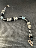 A Curated Collection of Sterling Silver Jewelry - thumbnail 17 of 19