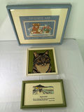 Three framed artworks: teddy bear cross-stitch, cat cross-stitch, and life-quote print - thumbnail 1 of 5